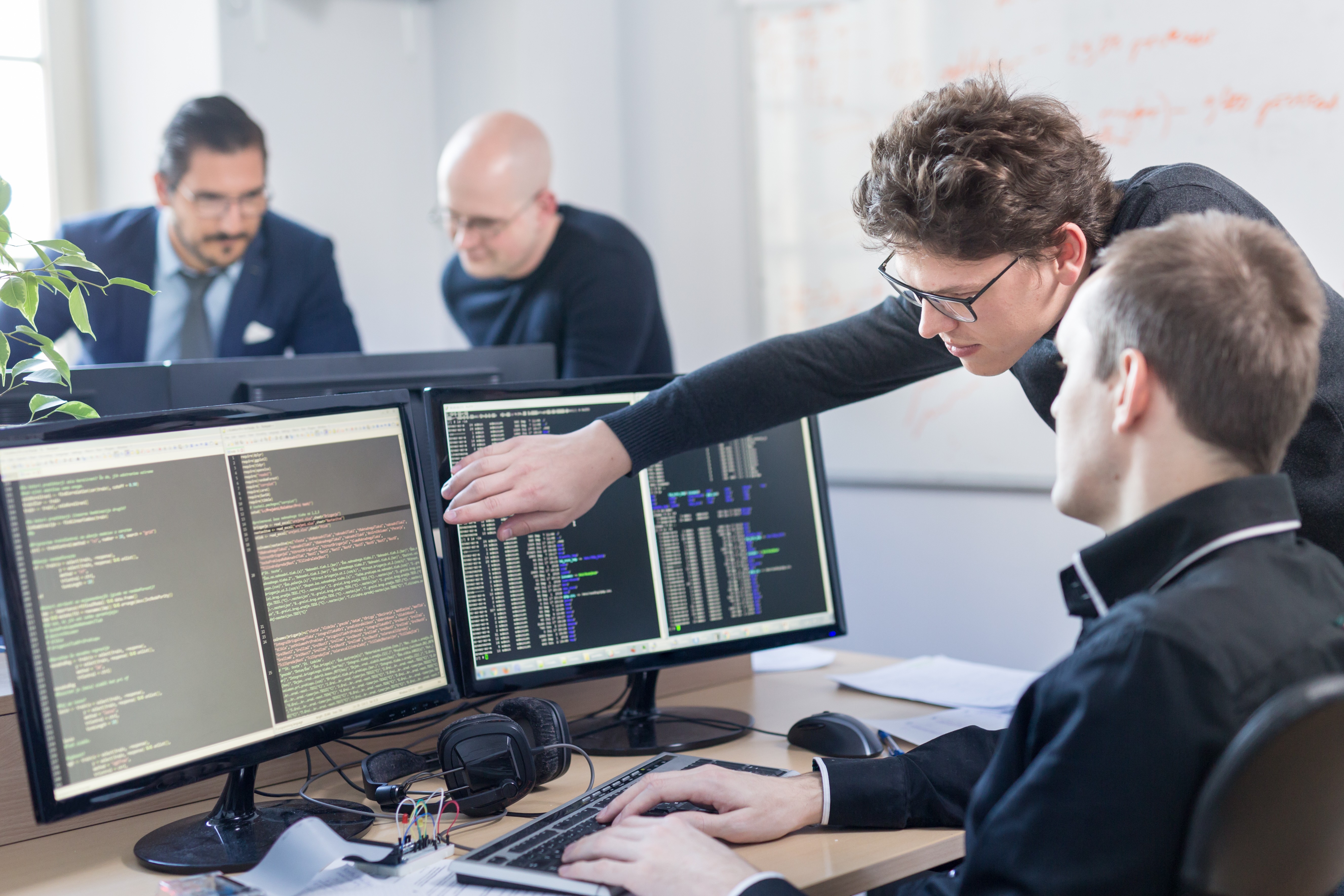 Developers collaborating on code